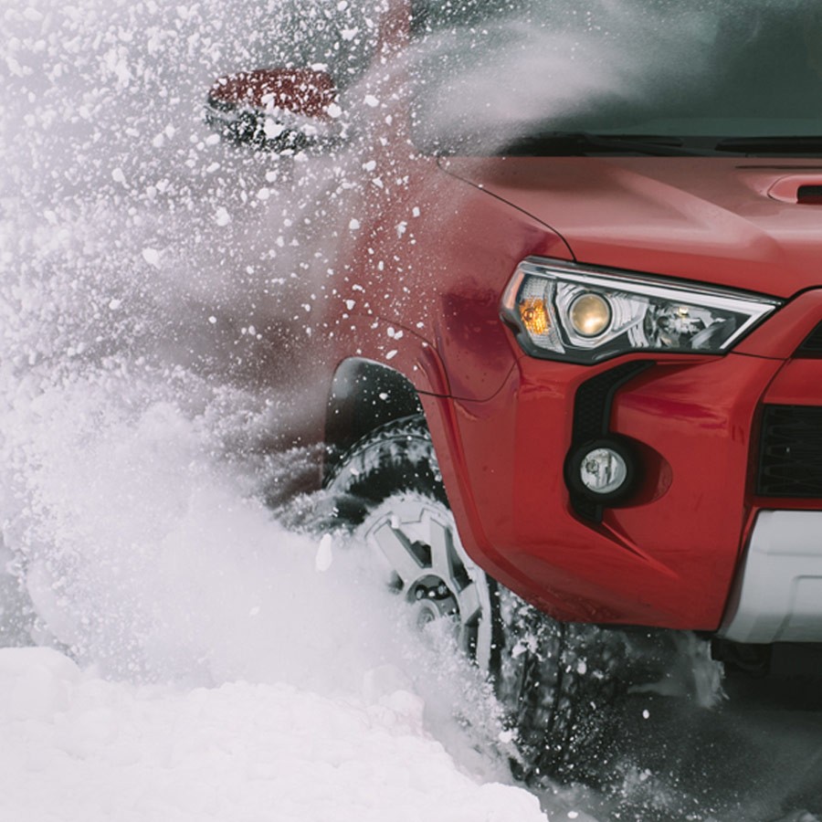 tire driving through snow