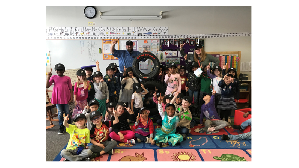 Firestone Complete Auto Care volunteering with kindergarten class
