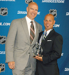 Alex DePalma receiving the 2011 Bridgestone Mark Messier Youth Leadership Award