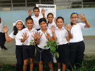 Group of kids planting trees