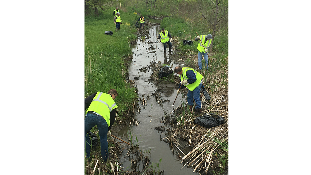 Bridgestone Bloomington, IL teammates clean up creek