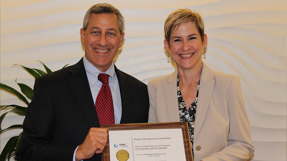 Gary Garfield, CEO and president, chairman, Bridgestone Americas, accepting the awards on behalf of Bridgestone.