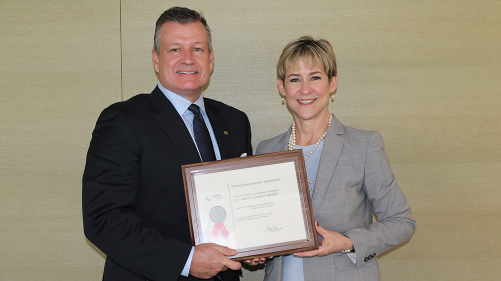 Gordon Knapp, CEO and president, Bridgestone Americas, Inc. with Anne Forristall Luke, RMA president and CEO