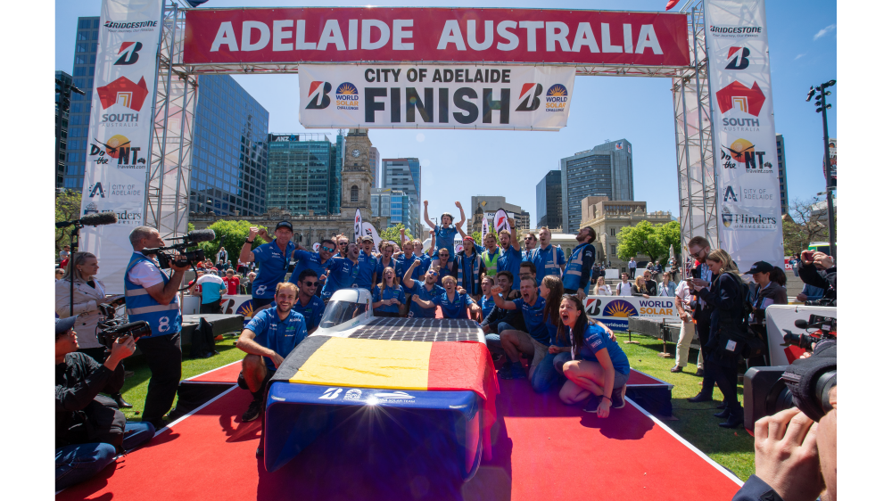 Solar car and members of “Agoria Solar Team,” winner of the Challenger Class