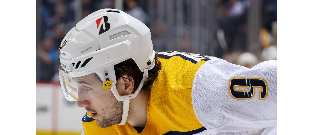 Nashville Predators Hockey Player wearing helmet with bridgestone B mark