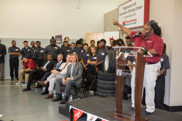 Ms. TJ Williams, instructor at the Maplewood High School’s Automotive Training Center, at the 2015 grand opening.