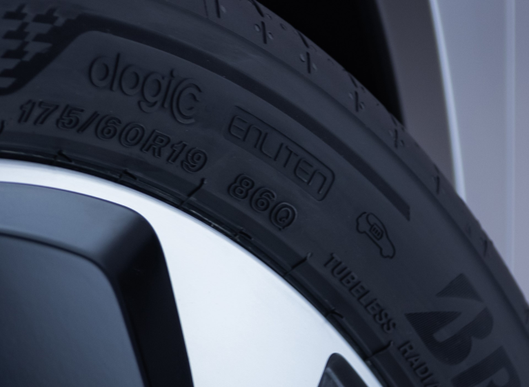 Close up of new marketing on Bridgestone tire to denote EV tire