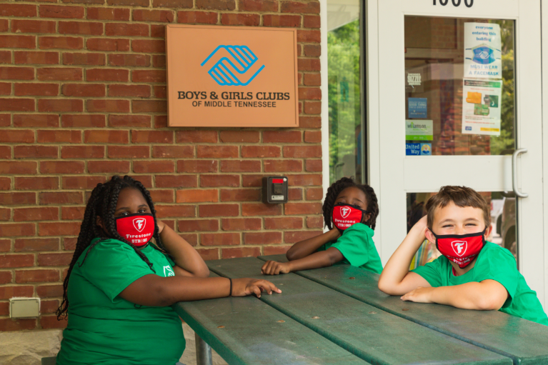 Three BGCA Club Kids wearing Masks donated by Bridgestone Americas