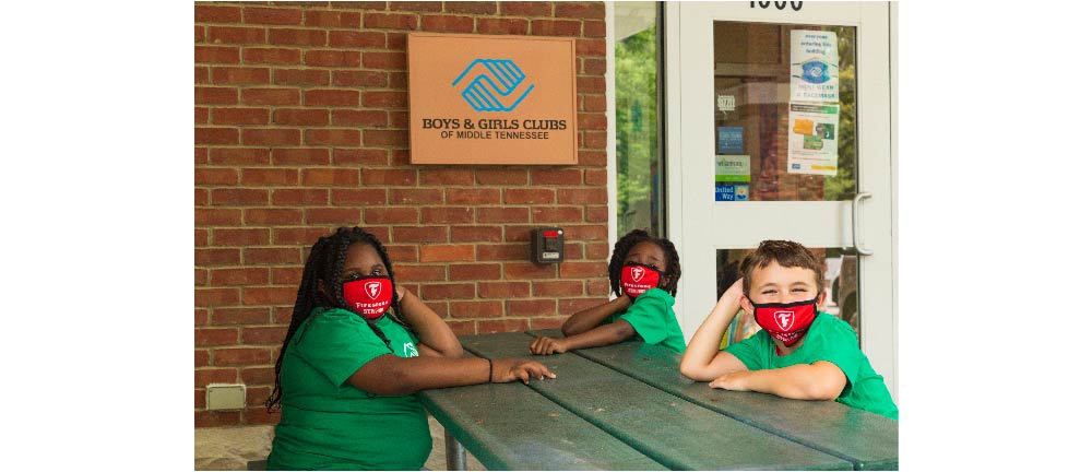 Three BGCA Club Kids wearing Masks donated by Bridgestone Americas