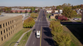 Shows various aerial views of the ATC campus, including the ATC building, ATC bridge (road view), ATPC, Tire Test Track, and Firestone Sign. You can view the entire campus shot from 1:38 to 1:48 in the Broll clip.