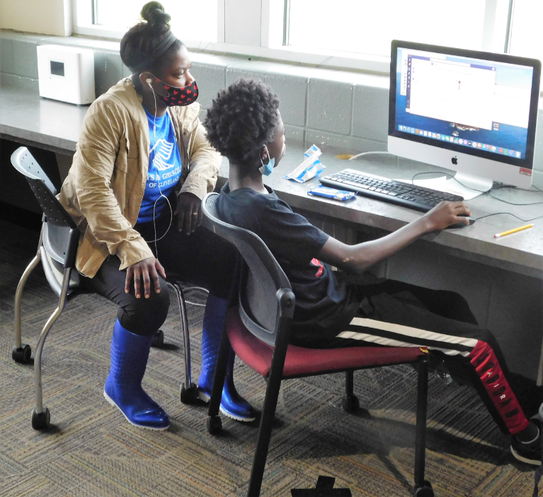 Boys & Girls Club employees help Club Kids access technology to support learning outside the classroom.