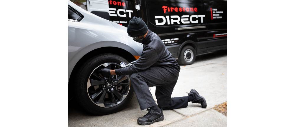 Firestone Direct Van in Driveway