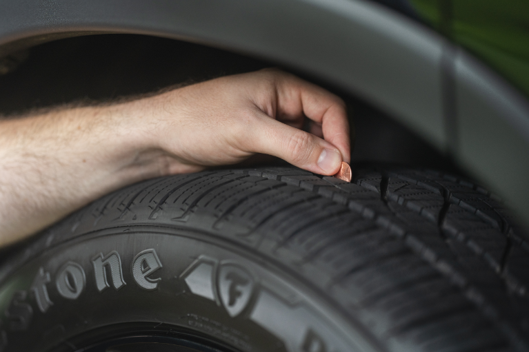 Driver Conducting Penny Test