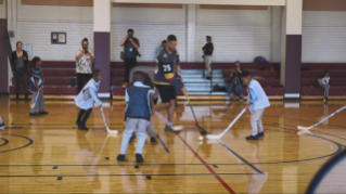 Vegas Golden Knight’s right winger Ryan Reaves plays hockey with local you