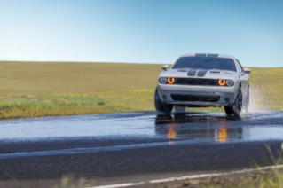 Action shot of Firestone Firehawk AS V2 in the rain from the front of the car