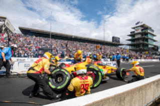 DHL / Romain Grosjean pit crew changing guayule tire