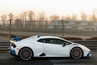 Passenger side shot of Bridgestone Potenza Race equipped on Lamborghini