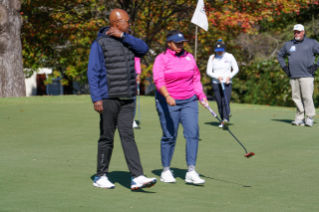 HBCU Women’s Golfer and coach leaving the green
