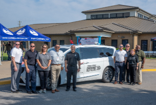 BSRO leadership gather around donated van at Fort Campbell Installation