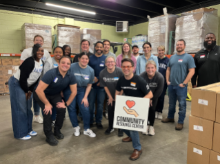  Group photo of Bridgestone employees during a volunteer activity at a local Nashville non-profit organization in support of the company's 2024 United by What Really Matters campaign.