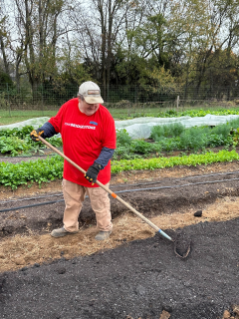 Bridgestone employee tends a garden during a volunteer activity at a local Nashville non-profit organization in support of the company's 2024 United by What Really Matters campaign.
