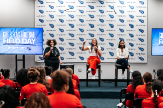 Bridgestone and 5 NFL teams held flag football camps this fall that included on-field drills, as well as panel discussions that focused on professional development.