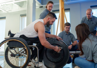 Paralympian Aaron Pike has been working with Bridgestone engineers to help design rubber equipment for racing wheelchairs and racing gloves.