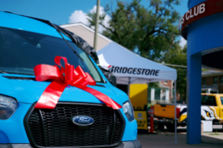 Bridgestone Retail Operations donates a brand-new passenger van to the Boys & Girls Clubs of Middle Tennessee.